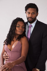 Black couple together looking thoughtful