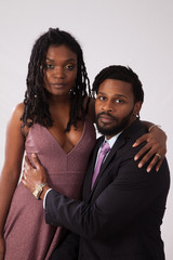 Black couple together looking thoughtful