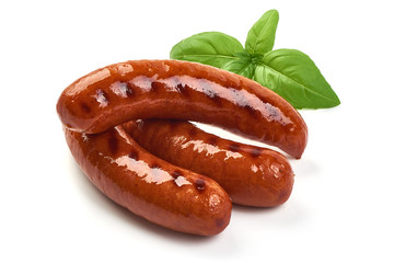 Grilled bratwurst Pork Sausages with basil leaves, close-up, isolated on white background