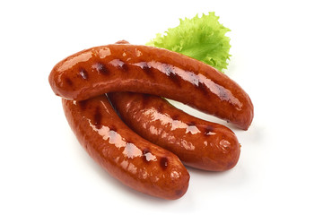 Grilled bratwurst Pork Sausages with lettuce, close-up, isolated on white background
