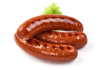 Grilled pork sausages with lettuce, close-up, isolated on white background