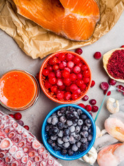 astaxanthin rich food as shrimps, red fish salmon, blueberry, cranberry, red seaweed, caviar, walmars tentacles