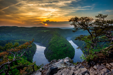 Landscape of canyon with river in sunset