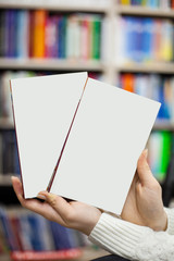 collection of various white paper on white background. a book under the library.