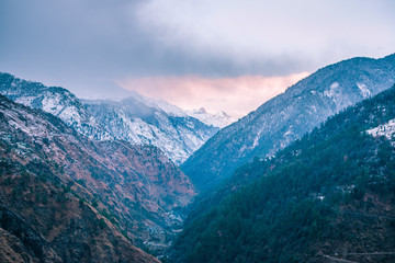 sunset view from mountaintop in himalayas in india