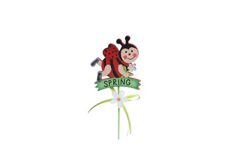 Naklejka premium A wooden figure of a spring ladybug on a white background