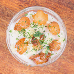 Crispy pieces of cracklings in smaltse