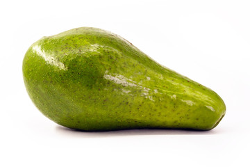 Exotic fruit perfect for advertising use. Typical Brazilian fruit known as avocado, in isolated background in high resolution photo.