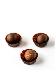 Chocolate pralines isolated on white background