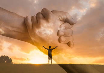 New beginnings and new start. Happy man with open arms facing the sunset. People reaching out for...