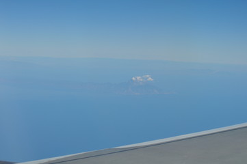Fototapeta na wymiar The beautiful view from airplane window, Mount Athos
