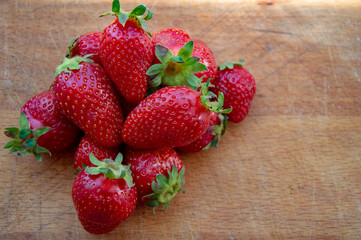 fresh strawberries on wooden table
