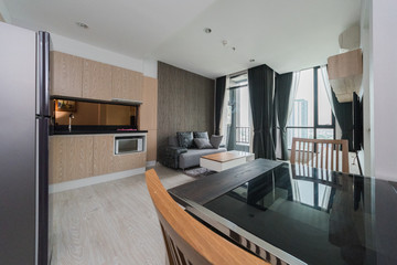 Naklejka na ściany i meble Modern living room and kitchen in small apartment .