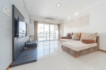 Large modern luxury condo living room interior. 
