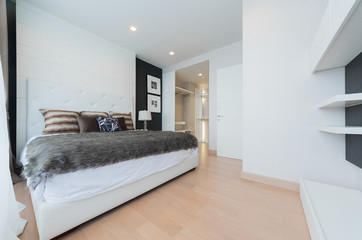 Interior of a spacious bedroom in loft apartment 