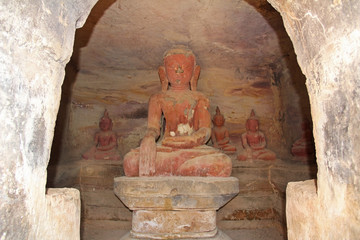 Old Buddha statues at Pho Win Taung Caves, Monywa city, Sagaing State, Myanmar, Asia.