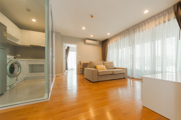 Modern living room and kitchen in small apartment