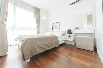Fototapeta na wymiar New modern bedroom in a apartment