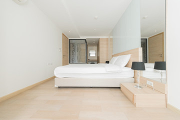 Naklejka na ściany i meble New modern bedroom in a apartment