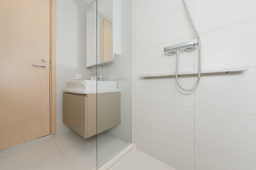 Toilet bowl in modern bathroom interior