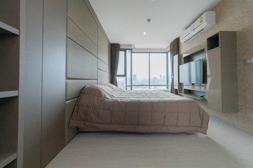 White comfortable pillow on bed decoration in hotel bed room 