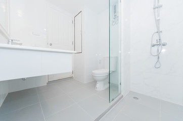 Naklejka na ściany i meble Clean and fresh bathroom with natural light.