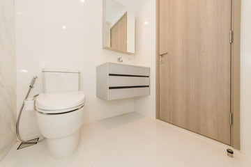 Fototapeta na wymiar Toilet bowl in modern bathroom interior