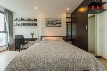 Bedroom interior, evening lighting