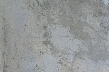 Shabby grey concrete texture with cracks and aging defects