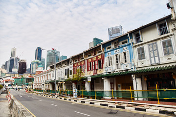 Naklejka na ściany i meble 19.03.2019 Singapore - View of the modern and old Chinese traditional buildings in the city.