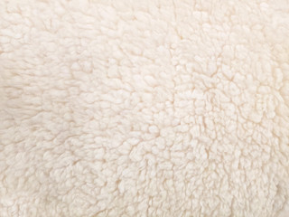close up of light beige fuzzy fur background