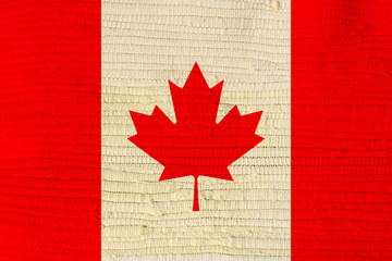 canada country flag on wicker canvas texture carpet