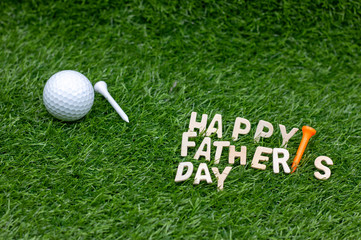 Happy Father's Day to golfer with golf ball on green