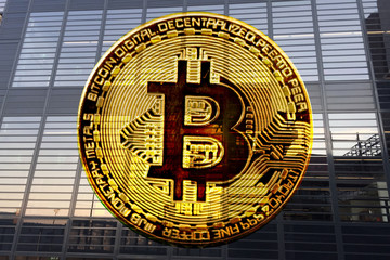 Bitcoin electronic cryptocurrency on urban background, concept banking