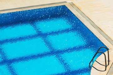 Empty swimming pool on a windy day, outdoors