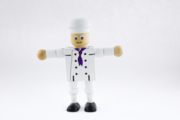 cook chef. wooden toy cook chef figure. isolated cook chef