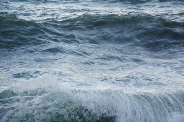 Naklejka na ściany i meble Seascape background of storm, white marine foam