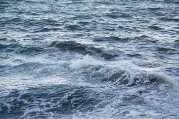 Seascape background of storm, white marine foam