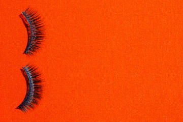 Eyeslashes and grunge background with space for text