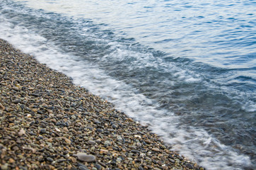 Seascape, view of stone beach and sea waves
