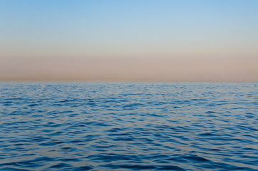 Obraz premium Seascape, view of sea horizon and colorful sky at sunset