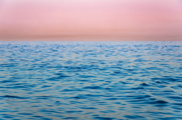Fototapeta na wymiar Seascape, view of sea horizon and colorful sky at sunset