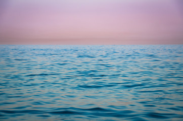 Fototapeta premium Seascape, view of sea horizon and colorful sky at sunset