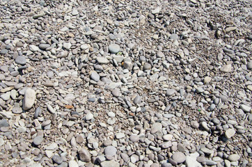 Textured background of stones, sea pebble on beach