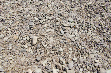 Textured background of stones, sea pebble on beach