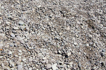 Textured background of stones, sea pebble on beach