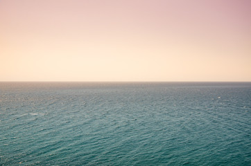 Fototapeta premium Seascape, view of sea horizon and colorful sky at sunset