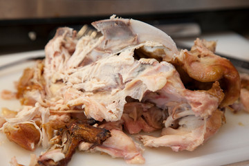 Chicken cut up and cooked on the counter