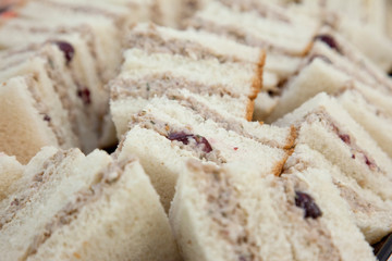 Chicken or turkey and cranberry triangle sandwiches