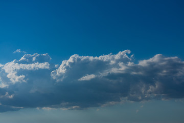Fototapeta na wymiar Blue sky with clouds. Blue sky with nimbostratus clouds. Blue sky with clouds background.